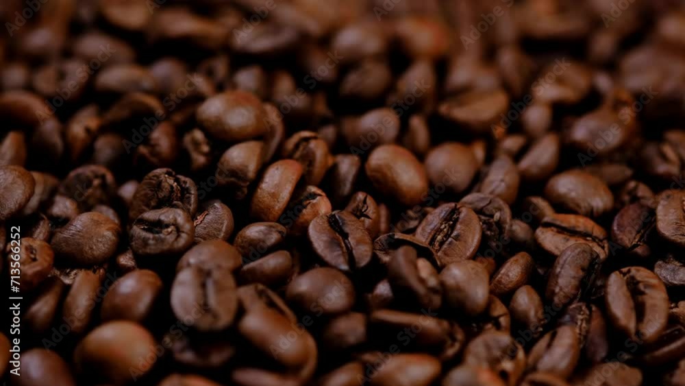 coffee beans in close-up on a black background coffee beans in close-up on a black background