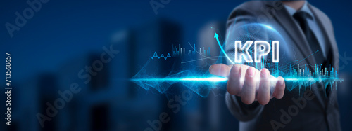 KPI. Businessman Holding Key Performance Indicator Icon and Global Network with Analyzing Technological Data, Metrics, Network Connection on Interface Background. Business Analytics.
