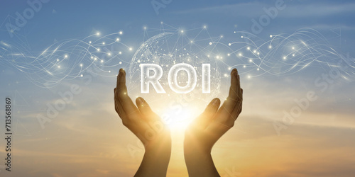 ROI. Man Holding Global Network and Connecting Data of Return on Investment with Business on the Internet, Financial Growth, Strategic Analysis.