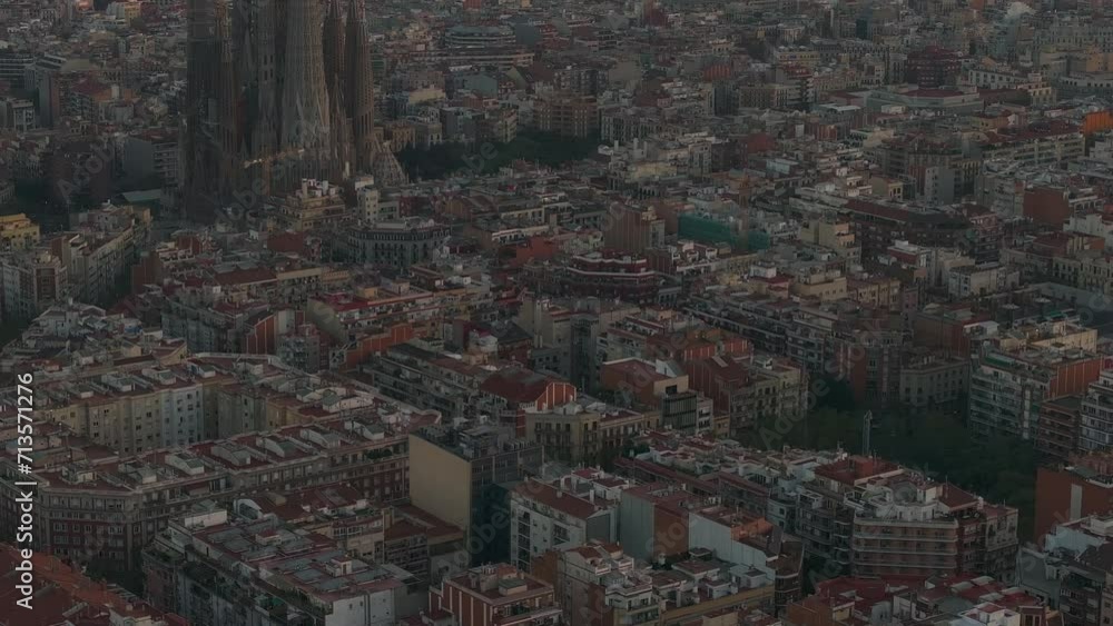 Aerial view of Barcelona City Skyline and Sagrada Familia Cathedral at sunset. Residential famous urban grid of Catalonia. Beautiful panorama of Barcelona. Aerial view of Barcelona City Skyline and Sagrada Familia Cathedral at sunset. Residential famous urban grid of Catalonia. Beautiful panorama of Barcelona.
