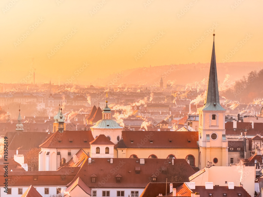 Prague's Mala Strana in winter dawn. Picturesque houses and rooftops in the morning sun. Prague, Czech Republic