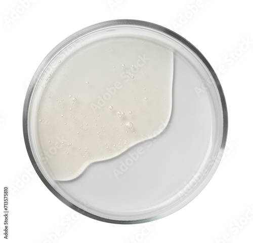 Petri dish with liquid sample on white background, top view