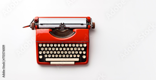 Banner, a red typewriter on the left on a white background, copy space for text