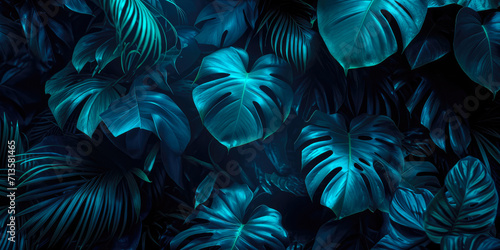 Summer neon background, cyber dark green, vivid colors of lights on palm leaves. Cyberpunk tropical exotic flat lay background
