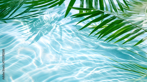 Swimming Pool with Clear Water and Palm Leaves. Tropical Paradise. Spa Salon Concept.