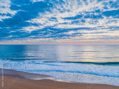 Sunrise at the seaside with clouds