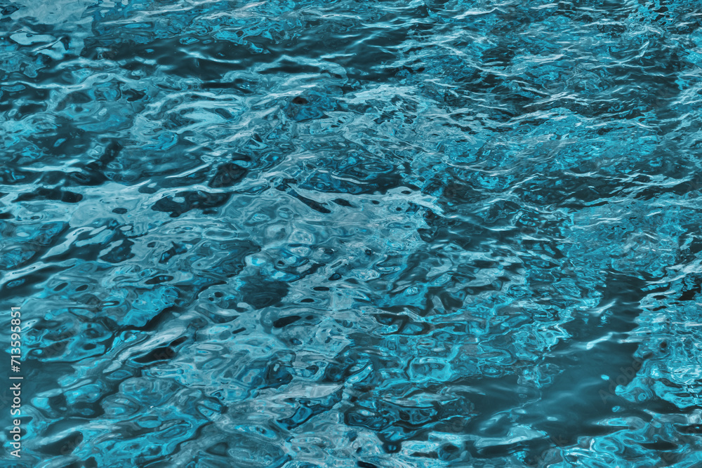 Blue sea water texture. Background of wavy blue water surface