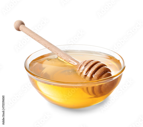 Tasty honey in bowl and dipper isolated on white