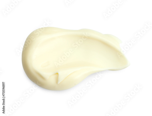 Tasty fresh mayonnaise sauce isolated on white, top view
