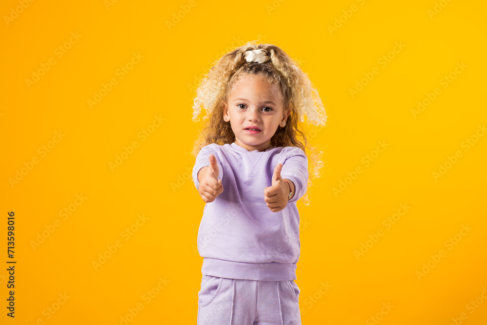 Child Girl Expressing Positivity with a Thumbs-Up Gesture ? Encouraging Success and Uplifting Vibes Child Girl Expressing Positivity with a Thumbs-Up Gesture ? Encouraging Success and Uplifting Vibes