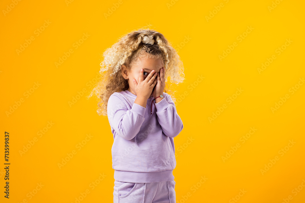 Crying girl with hands covering her eyes. Negative emotion, depression, stress concept. Crying girl with hands covering her eyes. Negative emotion, depression, stress concept.