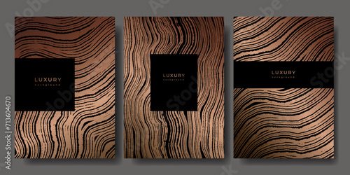 Set of templates. Luxury golden background with wood annual rings texture. Banner with tree ring pattern. Stamp of tree trunk in section. Wooden concentric circles. Black and bronze marble background