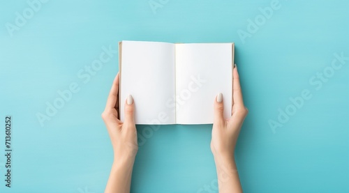 person holding blank book