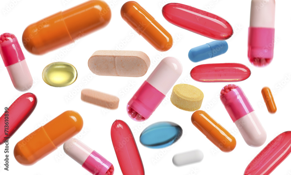 Many different flying pills on white background Many different flying pills on white background