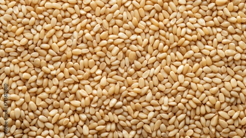 Top view of White sesame seeds. Background texture of raw White sesame seeds. Superfood. Copy space. Banner. Good for culinary and food concepts.