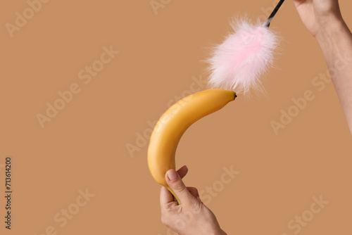 Young woman with banana and...