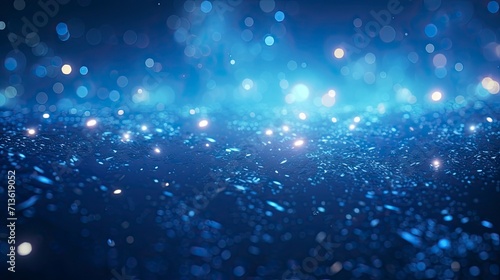 blue glow particle abstract bokeh background 