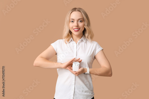 Pretty young woman with wir...