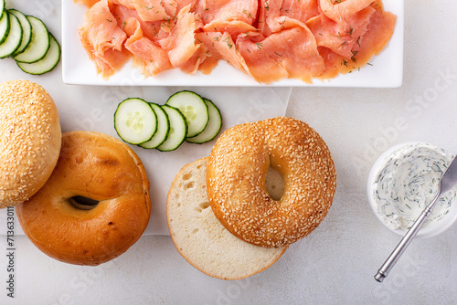 Bagels served with cream cheese and smoked salmon, sesame lox bagels