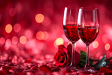 two glasses of wine and a rose on red background