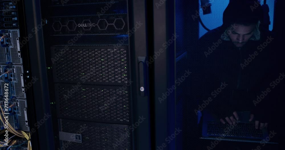 Control room, data center and hacker with laptop, cyber crime and ...