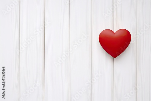 Overhead shot of a small red heart on a white wooden background - romantic concept, copy space - generative ai