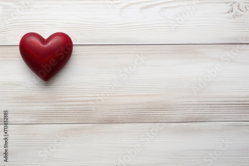 Overhead shot of a small red heart on a white wooden background - romantic concept, copy space - generative ai