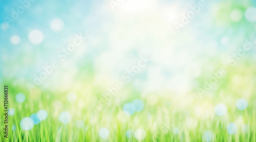 Summer background of blue and green  blurred foilage and sky with bright bokeh. Blurry abstract summer background. Natural green leaves using as cover page greenery environment ecology background