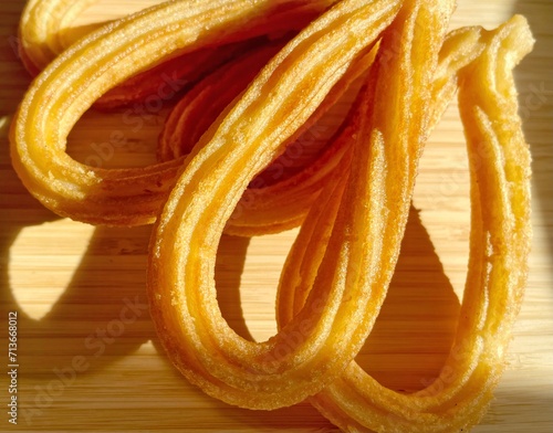 Traditional Spanish churros on a plate photo