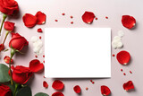 Greeting card mockup, white blank card with long stem red roses on one side and decorative petals around the note on light background. Valentine's day greeting card, flat lay, top view.