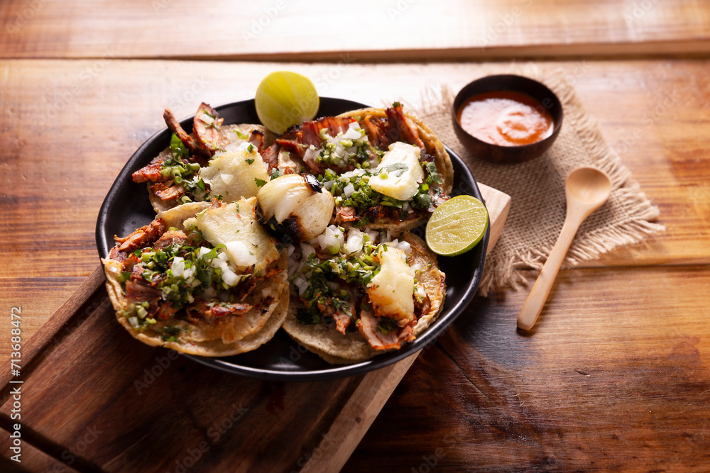 Tacos al pastor. Also known as Tacos de Trompo, they are the most