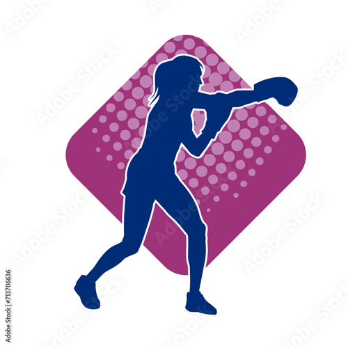 Silhouette of woman boxing athlete in action pose. Silhouette of a female wearing boxing gloves for boxing sport.