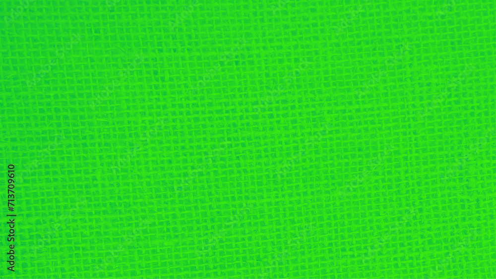 Closeup view of green burlap hessian sacking fabric as background