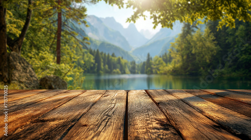 Wooden pier with natural lake and high mountain at background. photo