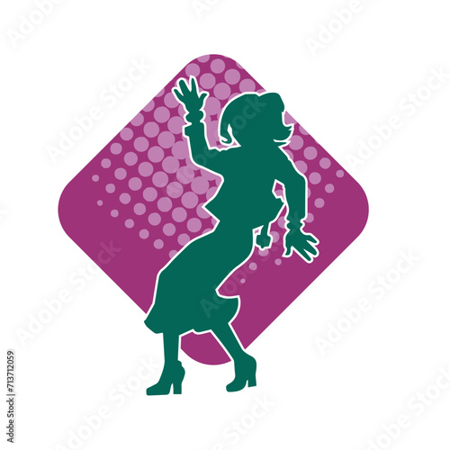 Silhouette of a female dancer in action pose. Silhouette of a woman dancing happily.