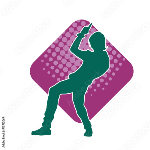 Silhouette of a male dancer in performing pose. Silhouette of a dancing man.