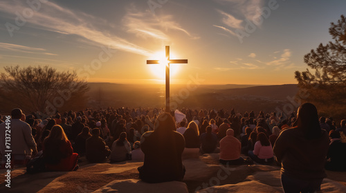 Organize a community sunrise service to celebrate the resurrection of Jesus Christ. Silhouette of christian prayers while praying to the Jesus. Christians prayed together in the church on sunrise sky
