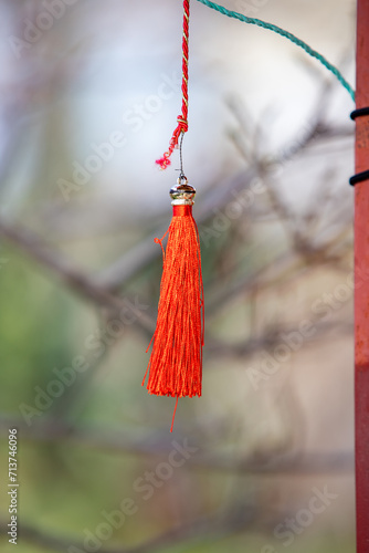 A red Japanese tassel hangs on the outside.