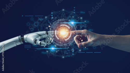 AI technology concept, Machine Learning, Robot hand touching human hand. to connect with global data refers to how humans can create and control artificial intelligence, AI innovation and technology. #713762258