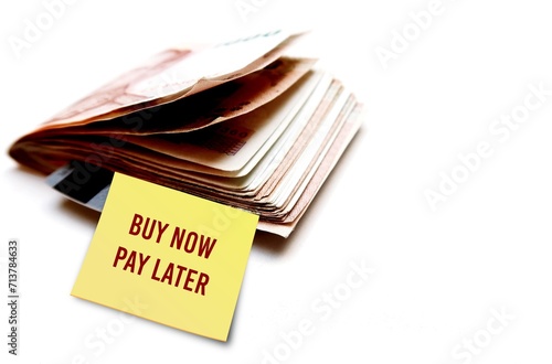 Schilderij op canvas Cash and credit card with text written Buy now, Pay later on copy space , short-
