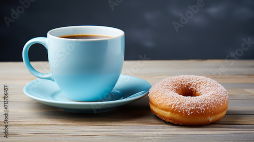 Savor the Moment with a Blue Donut and Coffee on a Gray Wooden Background  Perfect for Copy Space and Isolated Settings