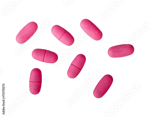 Group of pink medicine pills isolated