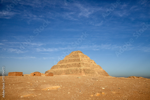 The First large stone building in the world - the step pyramid of king Djoser with some of the adjacent stone buildings. Saqqara  Egypt