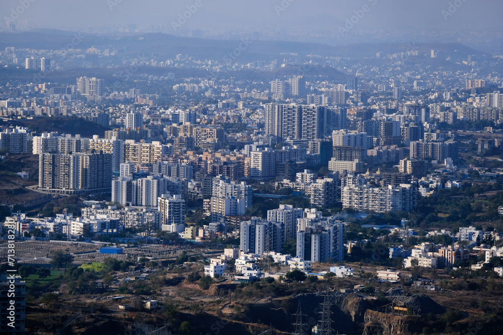 Fototapeta premium 19 January 2024, Cityscape Skyline, Cityscape of Pune city view from Bopdev Ghat, Pune, Maharashtra, India.