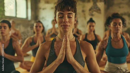 Image of a charismatic yoga instructor leading a group through a serene practice 
