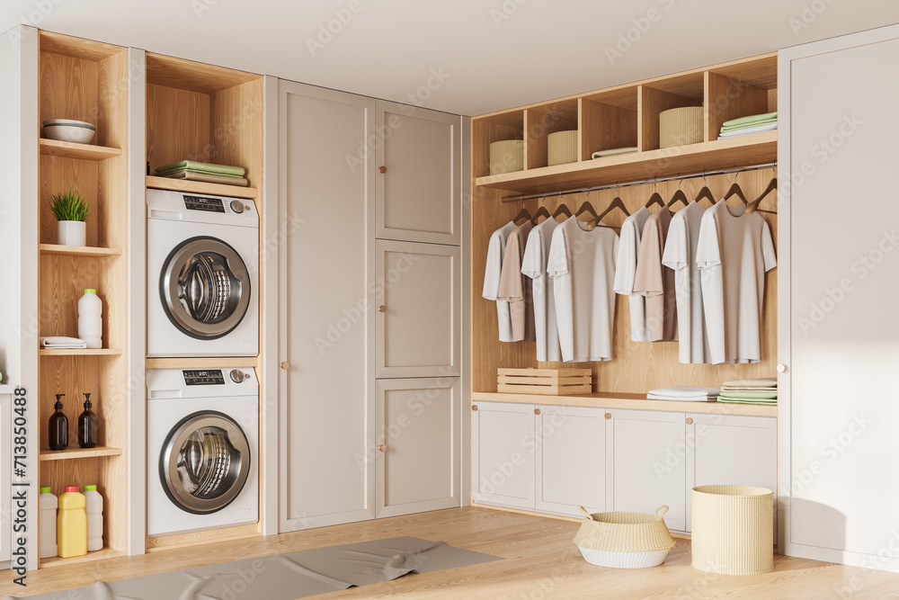 ภาพประกอบสต็อก Washing machines in laundry room interior with wardrobe ...