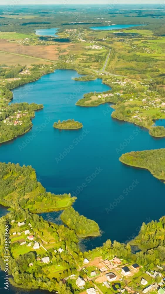 Hyperlapse Timelapse Dronelapse Aerial View Of Villages Houses On Rivers Lakes Islands Summer Day. Top View Of Lake Nature From Attitude. Scenery Scenic Calm Landscape. Hyperlapse Timelapse Dronelapse Aerial View Of Villages Houses On Rivers Lakes Islands Summer Day. Top View Of Lake Nature From Attitude. Scenery Scenic Calm Landscape.