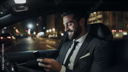 Caucasian businessman playing with cell phone in car. © S photographer
