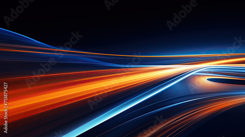 Abstract indigo and orange light streaks creating a fluid motion effect against a dark background