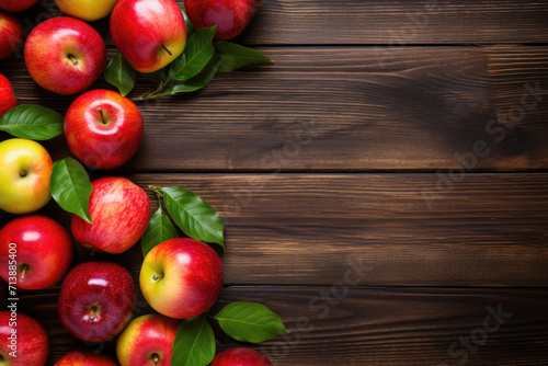 Apples on wooden background with blank text space
